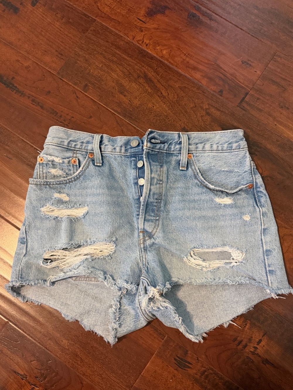 Light Wash Distressed Denim Shorts - Women's